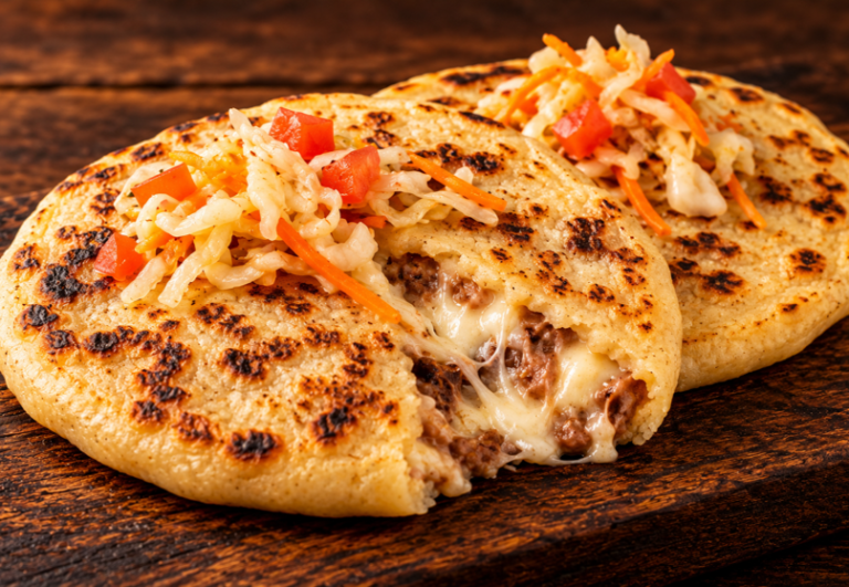 Cheese and bean pupusas served with curtido